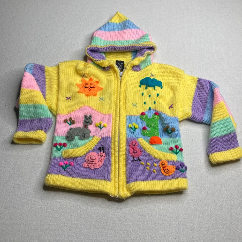Sisan Dina hand sewn zipper sweater. Size T6. 50% wool 50% cotton.